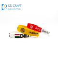 Made in china custom silicone rubber souvenir wristband bracelet with holes for children